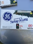 Vtg General Electric Miniature String-a-long 100 Christmas Lights Gold Orange. Fixed Price $14.99.
