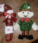 Christmas Candy Cane Elf Wreath Hanger Tinsel. Fixed Price $10.99.