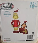 GEMMY5.5FT Grinch W/ Max & Gift Scene Christmas Inflatable. Fixed Price $39.99.