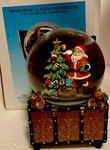 Kurt Adler Musical Wind-up Santa Waterglobe We Wish You Merry Christmas Cute. Fixed Price $32.99.