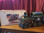 Grandeur Noel 2002 Collector's Edition Tin Christmas Locomotive Engine S-0204-1. Fixed Price $69.99.