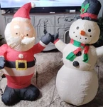 Gemmy Industries Inflatable Snowman & Santa Claus Blow Up Lawn Decor. Fixed Price $36.00.
