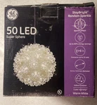 Ge Staybright Random Sparkle 50 Led Super Sphere Warm White Christmas Light 5.5". Fixed Price $22.99.