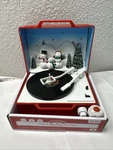 Holiday Time Animated Record Player 6" Lighted Musical Plays 3 Christmas Carols. Fixed Price $17.89.