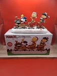 Peanuts Kurt Adler Battery Operated Musical Train Table Cor. Fixed Price $45.50.