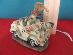 96. Youngs Deer Buck Christmas Ornament. Driving Jeep With Man On Hood. Fixed Price $12.99.