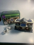 2009 Holiday Time Salvation Army Walmart Super Center Lighted Building W/ Box. Fixed Price $24.00.