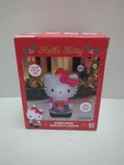 Airblown Inflatable Hello Kitty Holding Christmas Wreath Dress 4.5" Tall 2025. Fixed Price $49.99.