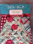 The Pioneer Woman Patchwork Poinsettia Plaid Scalloped Christmas Tree Skirt, 48". Fixed Price $29.99.