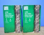 2 Boxes Home Accents Holiday 150 Warm White Ribbon Concave Led Net Lights. Fixed Price $39.99.