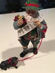 Possible Dreams Santa With Dog Christmas Figurine. Fixed Price $59.95.