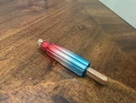Old World Christmas Blown Glass Oranment Bomb Pop Rocket 5.5". Fixed Price $16.98.