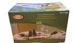 Holiday Living Musical Winter Vacation Scene # 0477384 Plays Jingle Bells Lights. Fixed Price $29.99.