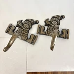 Cast Iron Mantle Place Stocking Holder 4.3 Lbs (both) Heavy Duty Snowman Skater. Fixed Price $19.99.