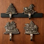 Set Of 4 Vtg Grandeur Noel Cast Iron Christmas Stocking Holders Santa Tree. Fixed Price $89.95.