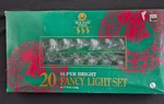Holiday Time 20 Clear Mini Bell Lights Christmas Green Wire 17 Feet Length. Fixed Price $6.00.