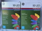 Two Sets Of Ge 50 Led C-5 Energy Smart Multicolor Christmas Lights. Fixed Price $36.00.