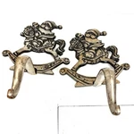 2 Cast Mantle Place Stocking Holder 4 Lbs (both) Heavy Santa On Rocking Horse. Fixed Price $19.99.