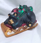 Margaret Cobane Hand Blown Painted Christmas Ornament Bear With Santa On Sleigh. Fixed Price $15.00.