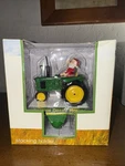 John Deere Santa On Tractor Christmas Stocking Holder. Fixed Price $20.00.