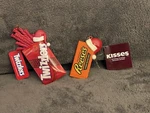 Twizzlers And Reese's Cups Santa Hat Ornament Two Pack Multi-color ***new***. Fixed Price $19.95.