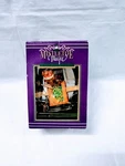 Mistletoe Magic North Pole Village Santa Claus Bear Ornament. Fixed Price $9.95.