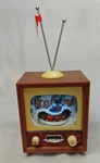 Roman Lighted Musical Tv Box Christmas Train Rotating Holiday Figurine. Fixed Price $95.99.