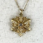 Vintage Golden Snowflake With Clear Crystal Center Pendant 19" Link Necklace. Fixed Price $17.95.