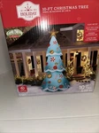 Holiday Time Inflatable Christmas Tree Airblown Lighted Yard 10' Tall. Fixed Price $64.79.