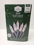 Holiday Time 300 Warm White Mini Led String Lights Strand Green Wire 62.3'. Fixed Price $10.00.