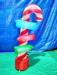 6' Air Blown Inflatable Candy Cane Pole W/ North Signs. Fixed Price $49.95.
