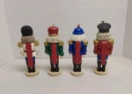 4 Nutcracker Figurines Resin Sculpture Christmas Holiday. Fixed Price $18.00.