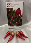 1 Holiday Time Red Chili Pepper String 8FT INDOOR/4 Ornament. Fixed Price $15.00.