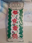 Minds Eye Christmas Holder 1983. Poinsettia. Holds 30 Cards. England. Nip. Fixed Price $22.50.