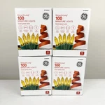 Ge String-a-long 100-COUNT Gold Christmas Lights Incandescent 4 Boxes. Fixed Price $25.00.