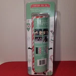 The Christmas Tree Hugger Pole Wrap Double Sided White Birch Or Candy Cane. Fixed Price $12.72.