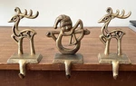 Medoore Stocking Holders 3 Reindeer Snowman Mantle Bronze Gold Christmas Holiday. Fixed Price $9.49.