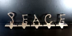 Pottery Barn Peace Stocking Holders 5 Christmas Polished Silver Tone Hangers. Fixed Price $50.00.