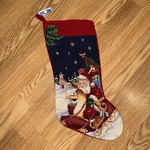 New Needlepoint Holiday Christmas Stocking Santa Sleigh Red Velveteen Backing. Fixed Price $30.00.
