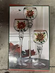 Home Essentials & Beyond Holiday Poinsettia Glass Hurricane Candle Christmas. Fixed Price $44.99.