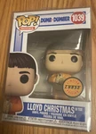 Lloyd Christmas Funko Chase With Orange Tuxedo And Bottle. Fixed Price $25.37.