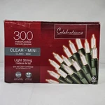 Celebrations 300 Clear Mini Light String Indoor Outdoor 62FT Green Wire 48150-71. Fixed Price $15.99.