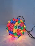 Ge Holiday Classics 100 Lights Super Sphere 6" Multicolor Starburst Reflectors. Fixed Price $25.99.