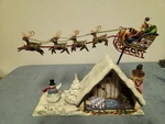 Jim Shore Dreams Fly Heartwood Creek 4002410 Santa & Reindeer Over Cottage. Fixed Price $75.00.