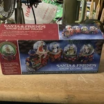 Santa & Friends Snow Globe Train Christmas Holiday Classics Collection Set Of 4. Fixed Price $16.25.