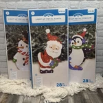 Holiday Time Christmas Yard Decoration Santa Snowman Penguin Led Light Set Of 3. Fixed Price $65.00.