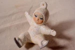1995 Ceramic Falling Ice Skater Snow Baby Christmas Tree Ornament. Fixed Price $29.99.