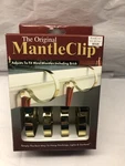 The Original Mantleclip Stocking Holder 4 Pack (brass) Adjusts Most Mantles. Fixed Price $18.00.