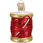 Old World Christmas Red Spool Of Thread Glass Blown. Fixed Price $27.99.