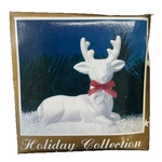 Holiday Collection From World Bazaars Inc. White Porcelain Reindeer Figurine. Fixed Price $9.59.